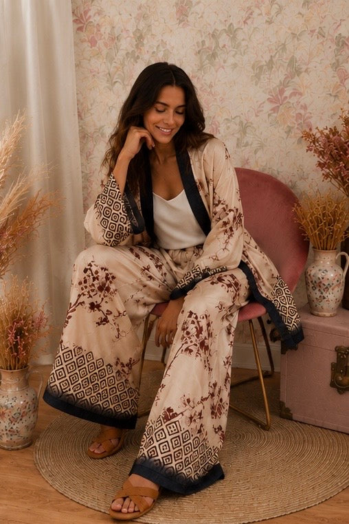 Pantalone con fantasia floreale - BEIGE