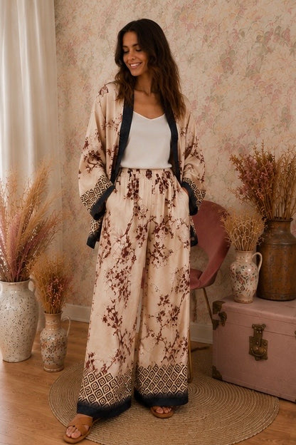 Pantalone con fantasia floreale - BEIGE